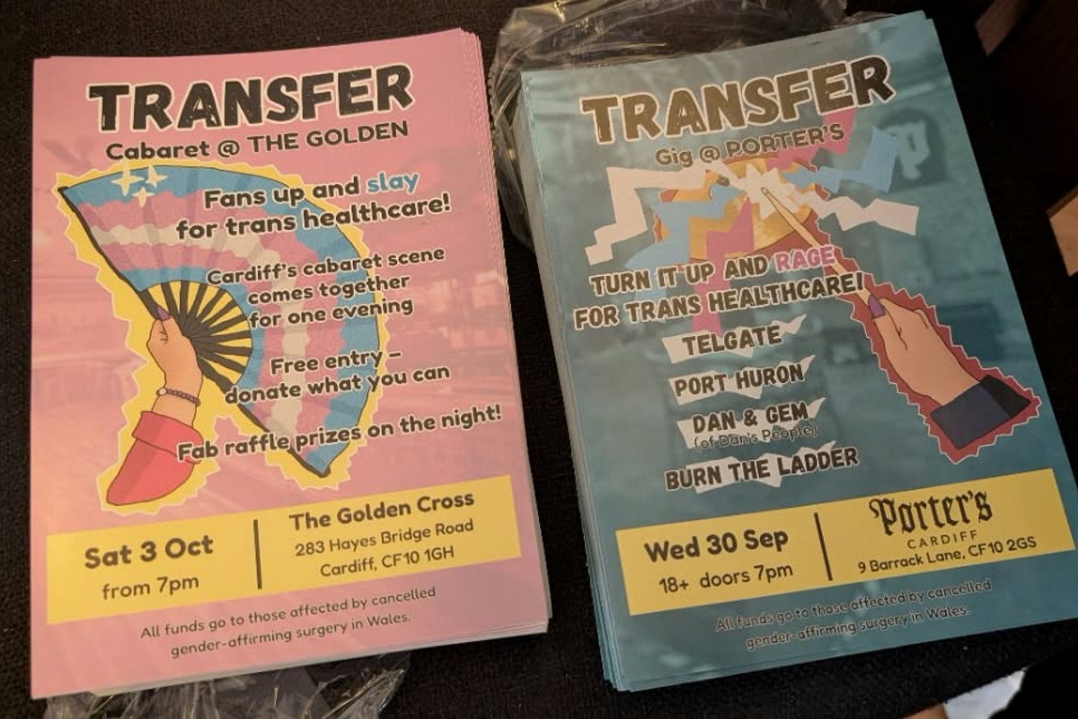 Printed TRANSFER posters, with a pink cabaret design and a blue gig design